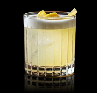 Invincible Vodka Sour cocktail on glass surface