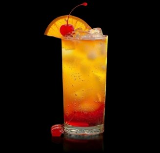 Vodka Sunrise cocktail on glass surface